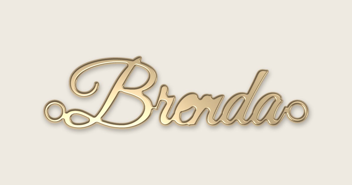 Brenda name necklace in 14k yellow gold, classic script lettering