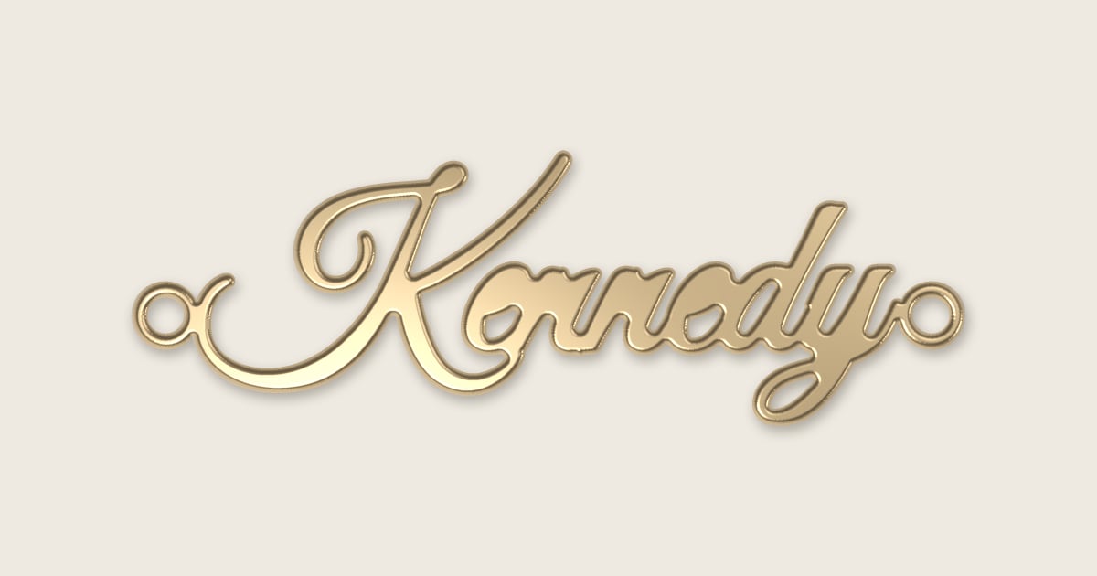 Kennedy name necklace in 14k yellow gold, classic script lettering