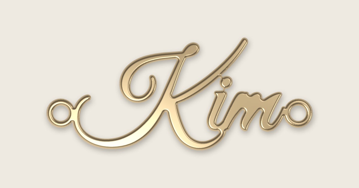 Kim name necklace in 14k yellow gold, classic script lettering