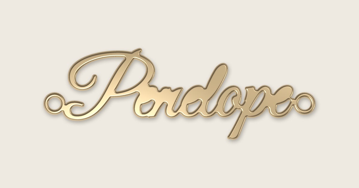 Penelope name necklace in 14k yellow gold, classic script lettering